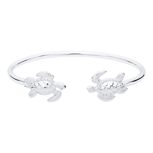 Pair of silver turtle-shaped bangles on a white background