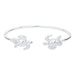 Pair of silver turtle-shaped bangles on a white background