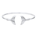 Silver bangle with whale tail design on a white background