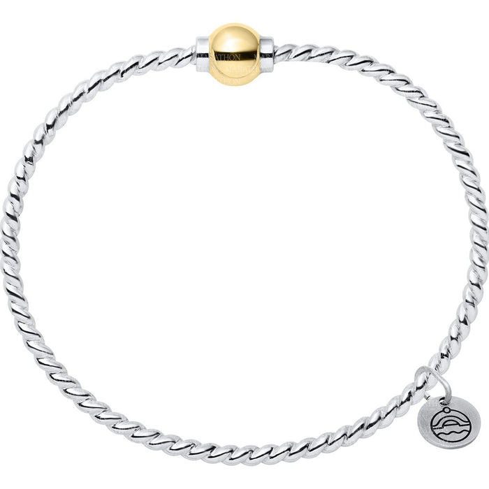Silver bracelet with a gold clasp on a white background
