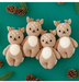 Cuddle + Kind Baby Fawn dolls – set of four handmade knit stuffed deer toys with pinecones and greenery.