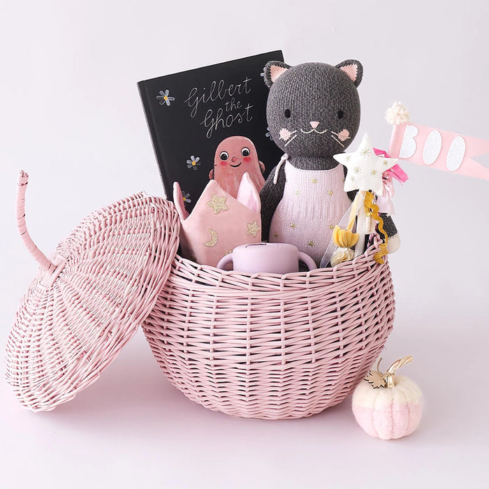 Little Nova the Kitten doll in a pink wicker gift basket with children’s book and plush accessories, perfect baby shower gift set.