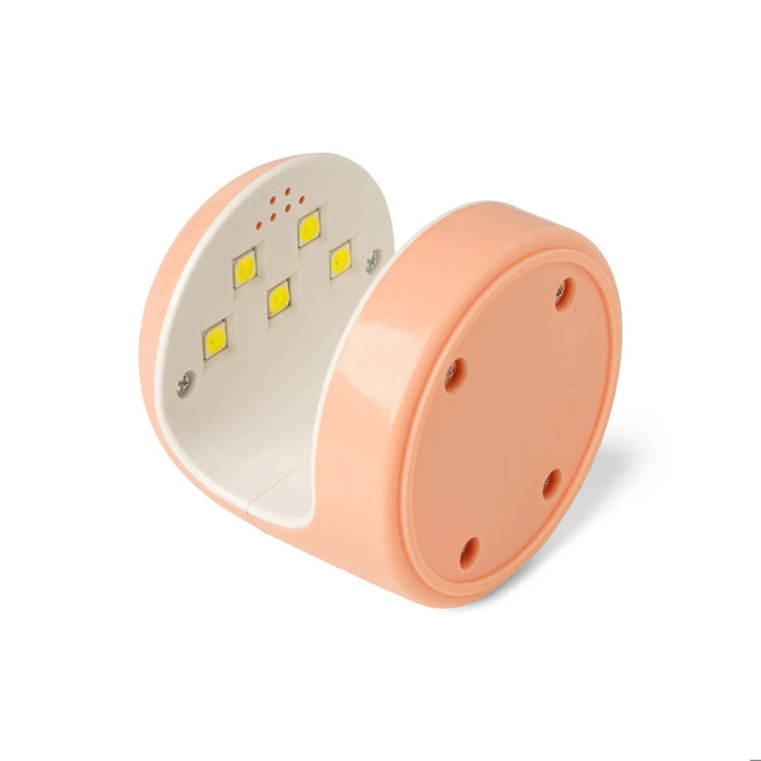 Coral UV Nail  lamp  on a white background