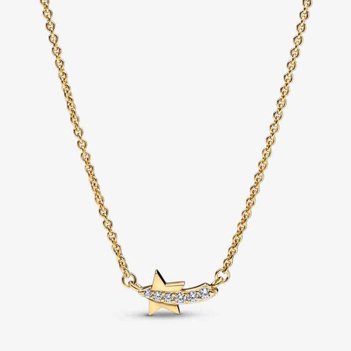 Gold necklace with a star-shaped pendant on a white background