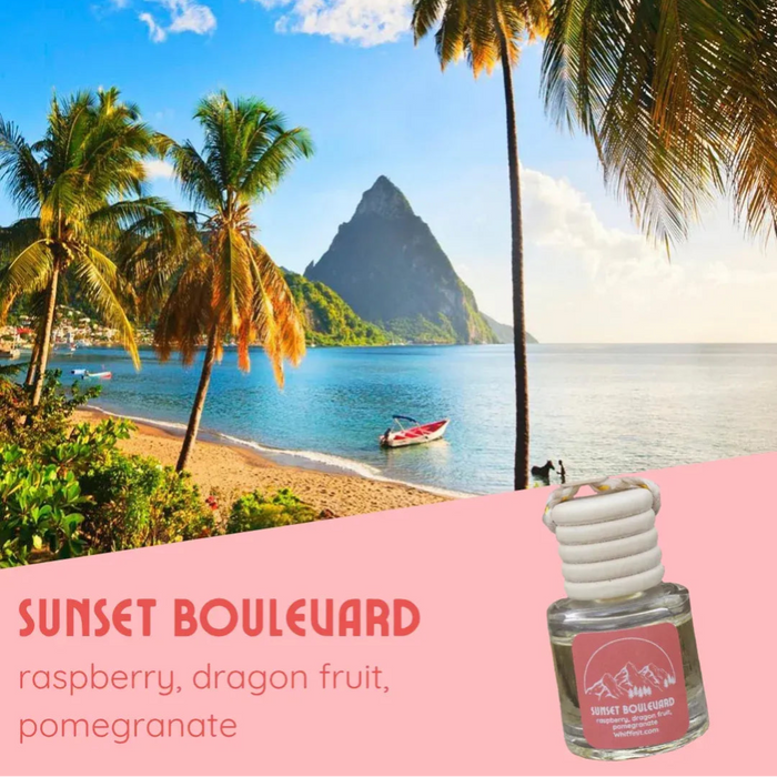 Scenic beach with palm trees and a boat, featuring a bottle of 'Sunset Boulevard' fragrance.