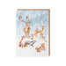 Card with illustrations of forest animals on a snowy background