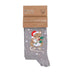 Gray sock with Christmas mouse design and packaging on a white background