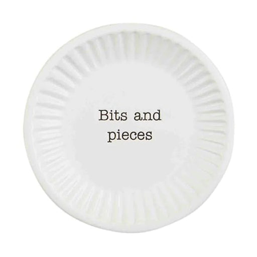 Mud Pie Bits and Pieces Plate featuring white ceramic with fluted edges and “Bits and pieces” text in black font.