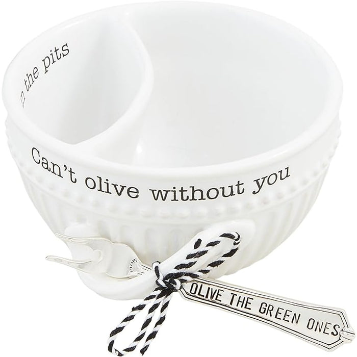 Mud Pie Olive Tidbit Set featuring white divided ceramic bowl with “Can’t olive without you” and “In the pits” text, paired with a silverplate fork labeled “Olive the green ones.”