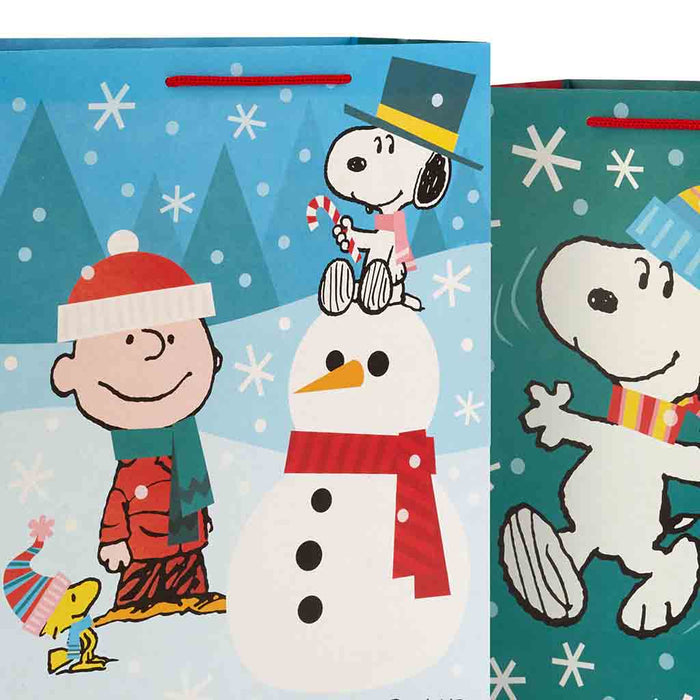 13 Peanuts® Gang Winter Fun Large Christmas Gift Bag - Gift Bags