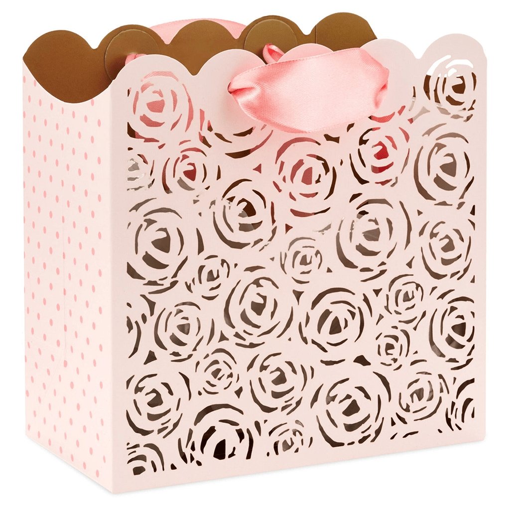 https://annieshallmark.com/cdn/shop/products/hallmark-55-pink-laser-cut-roses-small-square-gift-bag-572603_1500x1500.jpg?v=1681389763