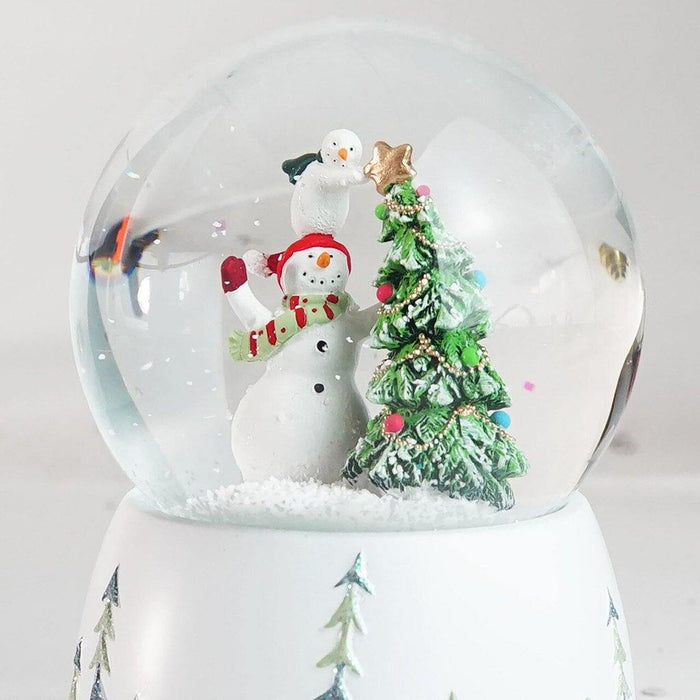 Snowmen Topping the Christmas Tree with a Star Musical Snow Globe, 5.75" - Snowmen Topping the Christmas Tree with a Star Musical Snow Globe, 5.75" - Annies Hallmark and Gretchens Hallmark, Sister Stores