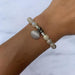 T. Jazelle : Moonstone Bracelet with Seashell Sterling Silver Charm -